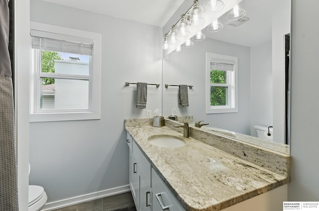935 S 150th St, Omaha, NE 68154 - bathroom featuring toilet and vanity