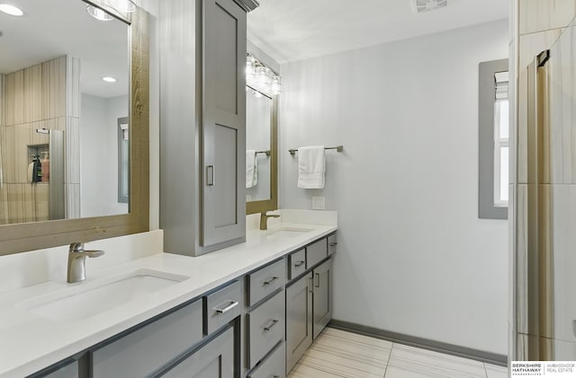 935 S 150th St, Omaha, NE 68154 - bathroom featuring double vanity, recessed lighting, and tile patterned flooring