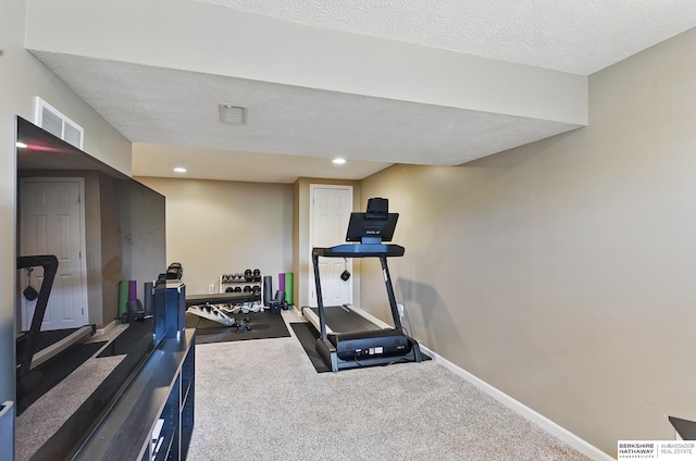 935 S 150th St, Omaha, NE 68154 - exercise room with a textured ceiling, recessed lighting, and carpet