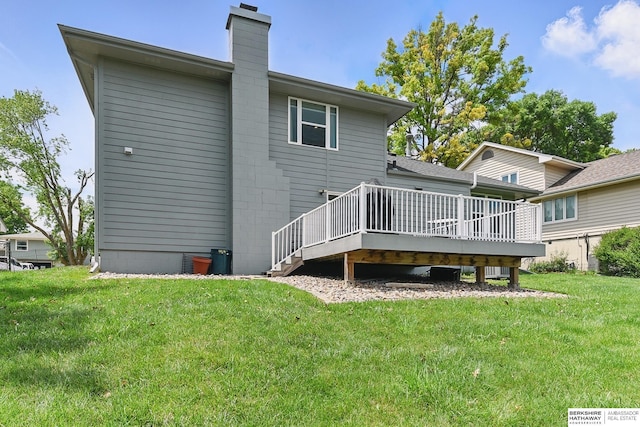 935 S 150th St, Omaha, NE 68154 - rear view of property featuring a wooden deck, a yard, and a chimney