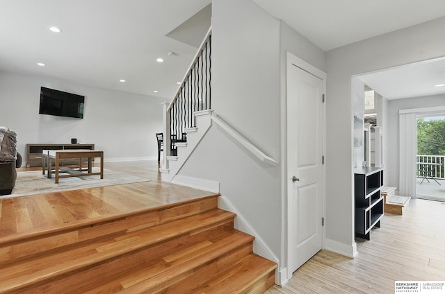 935 S 150th St, Omaha, NE 68154 - stairway featuring wood finished floors and recessed lighting