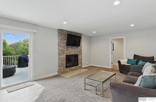 935 S 150th St, Omaha, NE 68154 - living area featuring recessed lighting, carpet flooring, and a stone fireplace