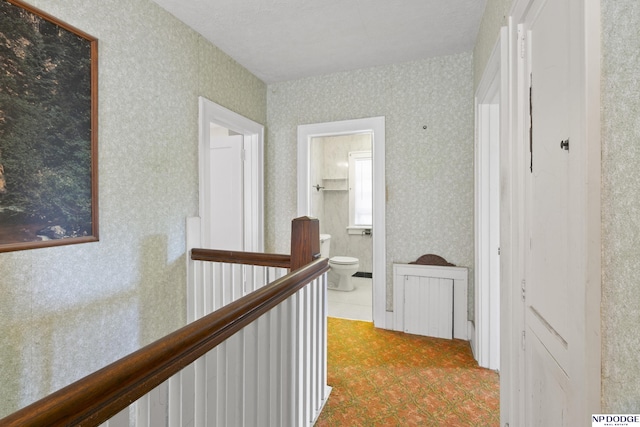 602 N 85th St, Omaha, NE 68114 - hallway featuring wallpapered walls and an upstairs landing