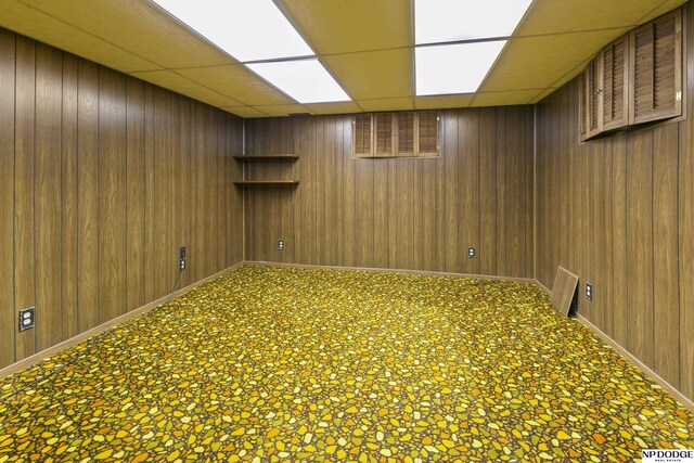 602 N 85th St, Omaha, NE 68114 - unfurnished room featuring a paneled ceiling and wood walls