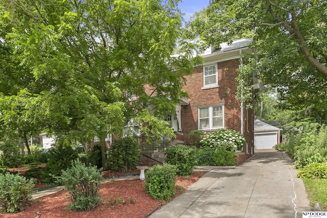 602 N 85th St, Omaha, NE 68114 - view of front of home with brick siding and a garage