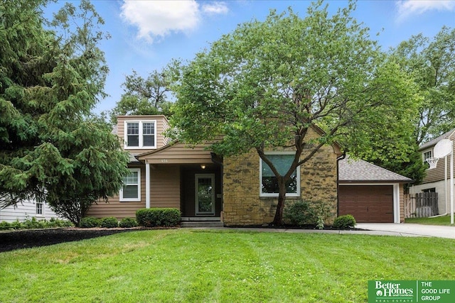 454 N 61st St, Omaha, NE 68132 - view of front of property with a front yard, concrete driveway, and a garage