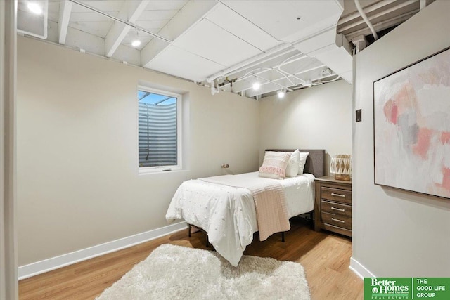 454 N 61st St, Omaha, NE 68132 - bedroom with track lighting and wood finished floors