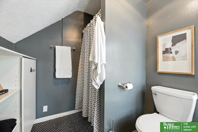 454 N 61st St, Omaha, NE 68132 - full bathroom with a textured ceiling and lofted ceiling