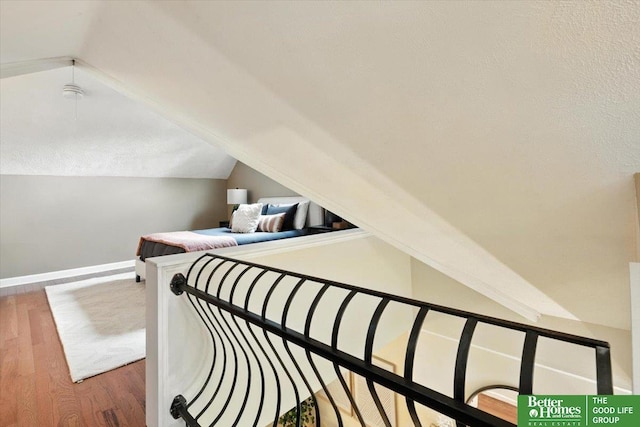 454 N 61st St, Omaha, NE 68132 - bedroom featuring vaulted ceiling and wood finished floors