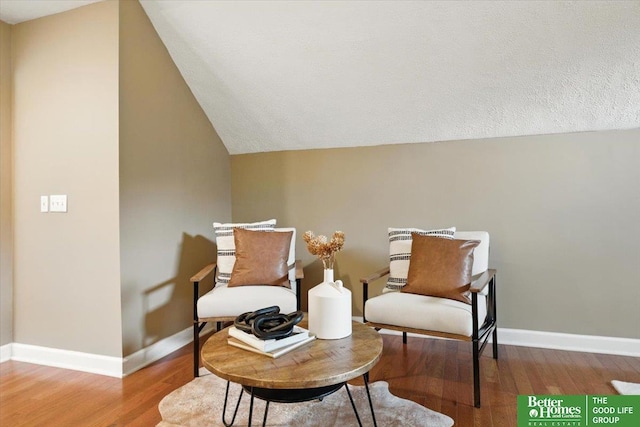 454 N 61st St, Omaha, NE 68132 - living area with vaulted ceiling and wood finished floors
