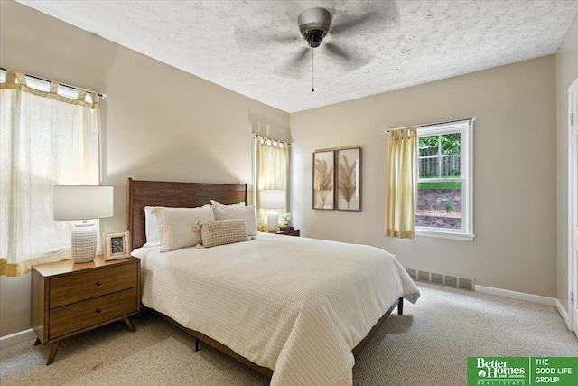 454 N 61st St, Omaha, NE 68132 - bedroom with light carpet and a ceiling fan