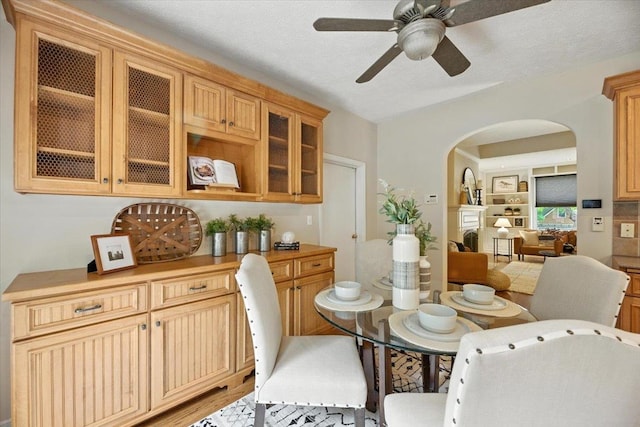 454 N 61st St, Omaha, NE 68132 - dining space with arched walkways and ceiling fan