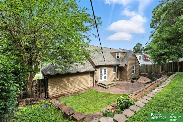 454 N 61st St, Omaha, NE 68132 - rear view of property featuring roof with shingles