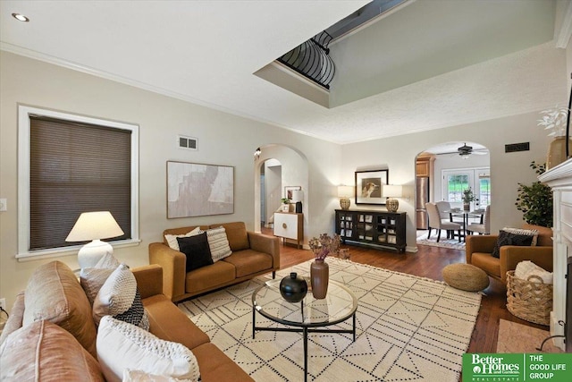 454 N 61st St, Omaha, NE 68132 - living area with arched walkways, crown molding, wood finished floors, a ceiling fan, and recessed lighting