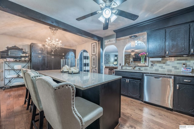 2105 S 164th Ave, Omaha, NE 68130 - kitchen with dishwasher, hardwood / wood-style flooring, ceiling fan, arched walkways, and beamed ceiling
