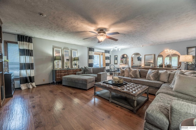 2105 S 164th Ave, Omaha, NE 68130 - living area with arched walkways, a ceiling fan, plenty of natural light, a textured ceiling, and hardwood / wood-style flooring