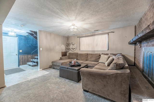 2105 S 164th Ave, Omaha, NE 68130 - carpeted living area with a fireplace, a textured ceiling, and a chandelier