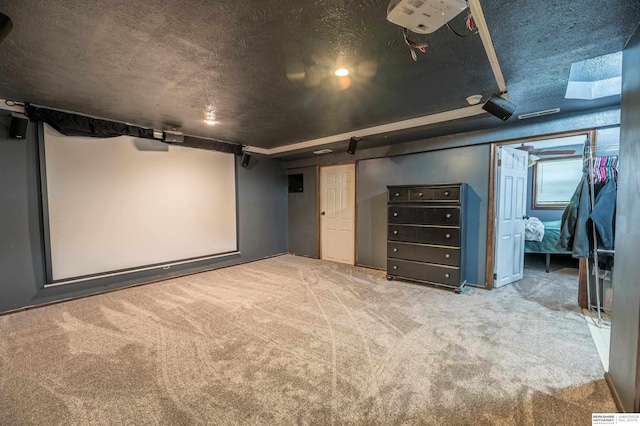 2105 S 164th Ave, Omaha, NE 68130 - cinema room with carpet floors and a textured ceiling
