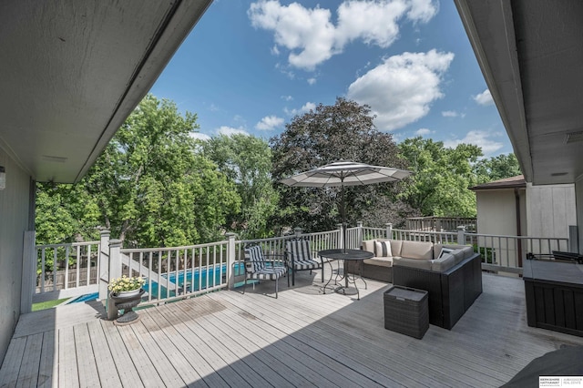 2105 S 164th Ave, Omaha, NE 68130 - wooden terrace featuring an outdoor living space and view of wooded area