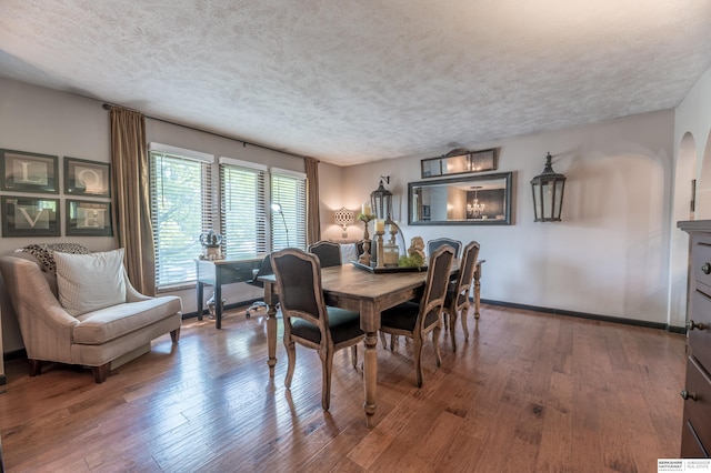 2105 S 164th Ave, Omaha, NE 68130 - dining room with wood finished floors and a textured ceiling