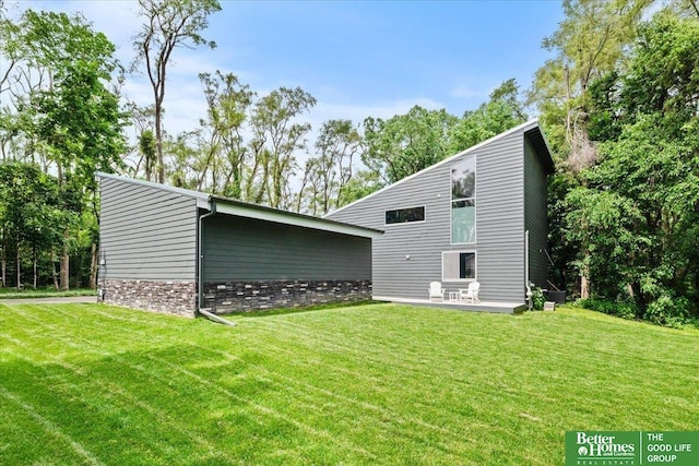 5510 N 83rd St, Omaha, NE 68134 - back of house featuring a yard and a patio area