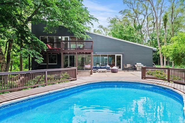 5510 N 83rd St, Omaha, NE 68134 - outdoor pool featuring a wooden deck, grilling area, and a patio area