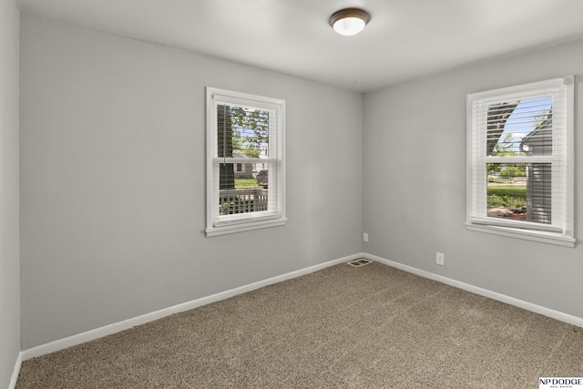 402 W 30th Ave, Bellevue, NE 68005 - spare room with carpet flooring and baseboards