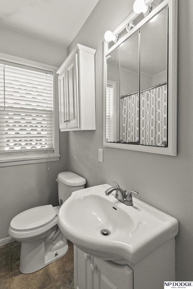 402 W 30th Ave, Bellevue, NE 68005 - bathroom featuring plenty of natural light and tile patterned flooring