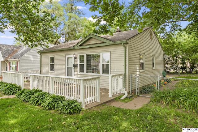 402 W 30th Ave, Bellevue, NE 68005 - view of front facade featuring a wooden deck and a shingled roof