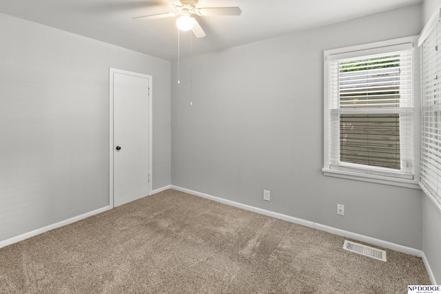 402 W 30th Ave, Bellevue, NE 68005 - carpeted empty room with a ceiling fan and baseboards
