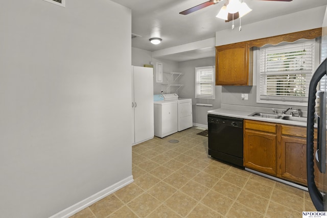 402 W 30th Ave, Bellevue, NE 68005 - kitchen with black dishwasher, washing machine and dryer, a ceiling fan, light countertops, and brown cabinetry