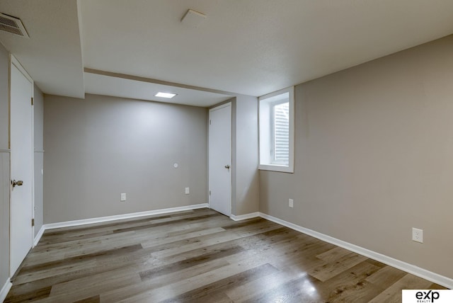 7622 Sherman Dr, Omaha, NE 68134 - basement with wood finished floors