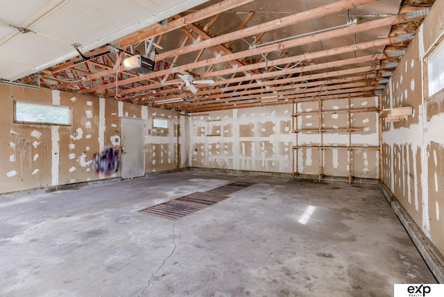 7622 Sherman Dr, Omaha, NE 68134 - garage featuring a garage door opener