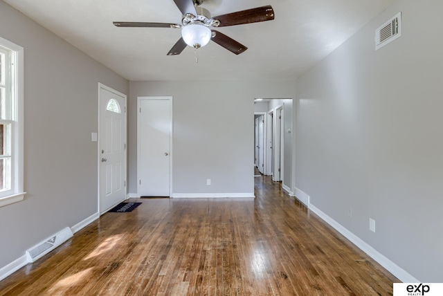 7622 Sherman Dr, Omaha, NE 68134 - spare room with a ceiling fan and wood finished floors