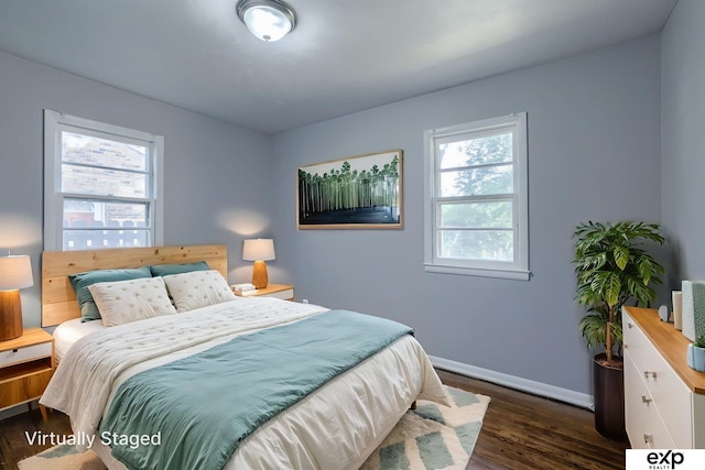 7622 Sherman Dr, Omaha, NE 68134 - bedroom with dark wood-style floors and baseboards