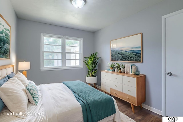 7622 Sherman Dr, Omaha, NE 68134 - bedroom with dark wood-style flooring and baseboards