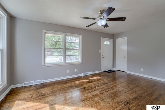 7622 Sherman Dr, Omaha, NE 68134 - entrance foyer with a ceiling fan and wood finished floors