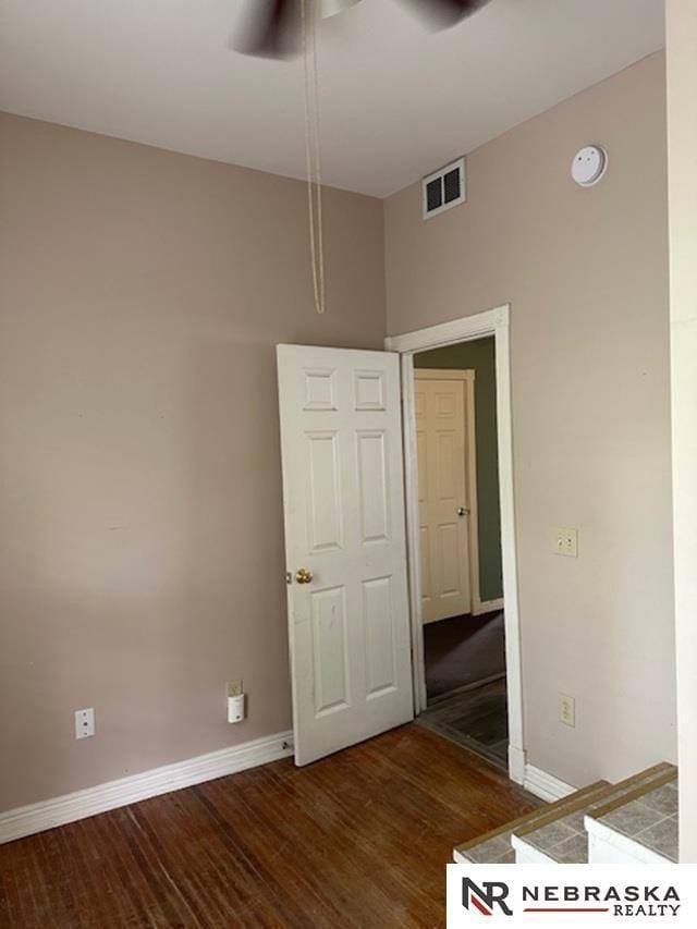 3123 R St, Lincoln, NE 68503 - spare room featuring a ceiling fan, wood finished floors, and a smoke detector