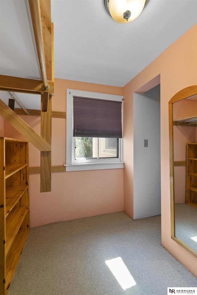 2615 C St, Lincoln, NE 68502 - unfurnished living room with carpet flooring