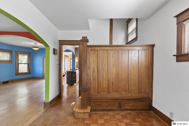 2615 C St, Lincoln, NE 68502 - foyer entrance with baseboards and arched walkways
