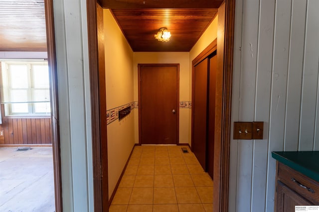 1621 Ridge Rd Lot B, Lot B, Fremont, NE 68025 - corridor with wooden walls and light tile patterned floors