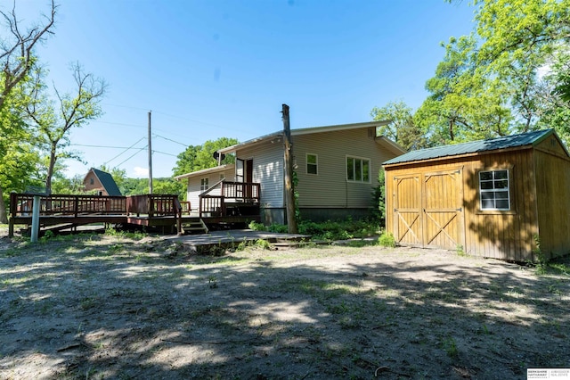 1621 Ridge Rd Lot B, Lot B, Fremont, NE 68025 - rear view of house with a storage shed and a wooden deck