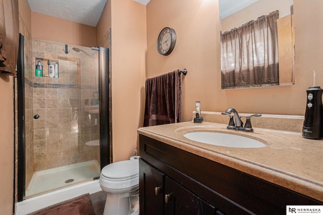 10605 Laurel Ave, Omaha, NE 68134 - full bathroom with vanity, a stall shower, and a textured ceiling