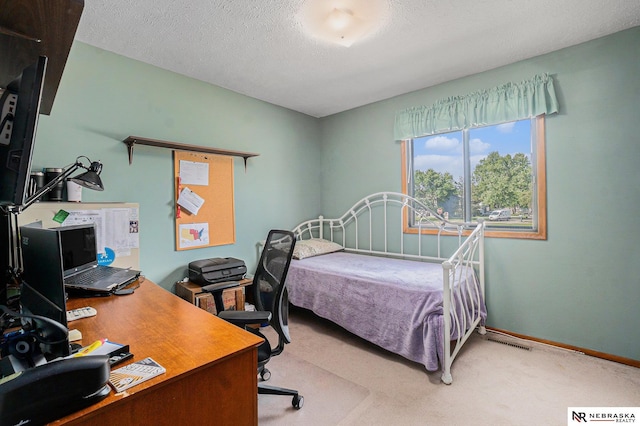10605 Laurel Ave, Omaha, NE 68134 - carpeted bedroom with an office area and a textured ceiling