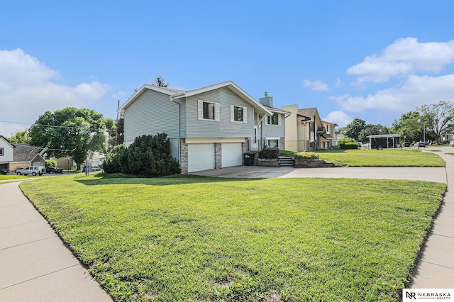 10605 Laurel Ave, Omaha, NE 68134 - view of front of property with concrete driveway, an attached garage, a front lawn, and a residential view