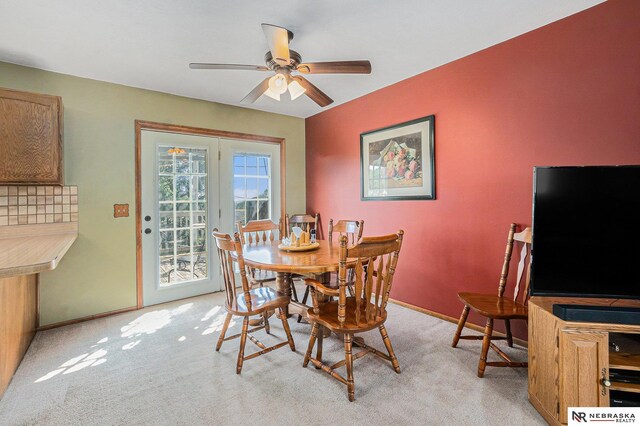 10605 Laurel Ave, Omaha, NE 68134 - dining area with a ceiling fan and light carpet