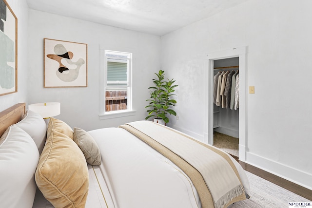 2738 Browne St, Omaha, NE 68111 - bedroom with wood finished floors and a walk in closet