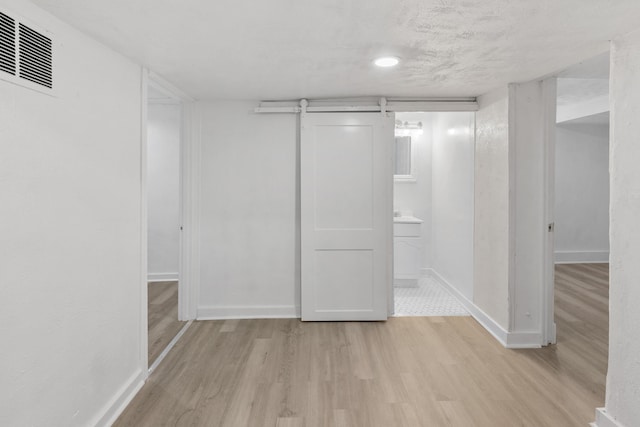 2738 Browne St, Omaha, NE 68111 - finished basement featuring light wood finished floors and baseboards