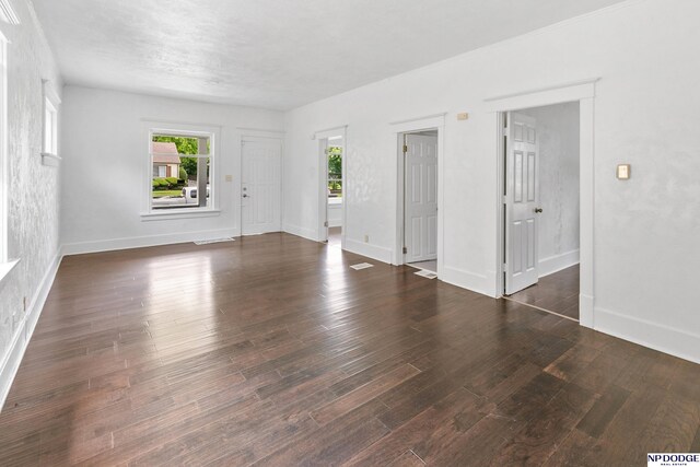 2738 Browne St, Omaha, NE 68111 - unfurnished room featuring wood finished floors and baseboards
