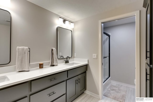 20709 Woodridge Dr, Gretna, NE 68028 - full bathroom with an enclosed shower and double vanity